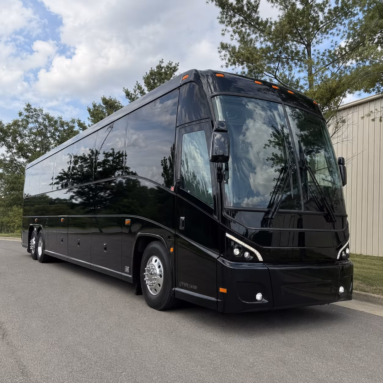norman long distance charter bus prices
